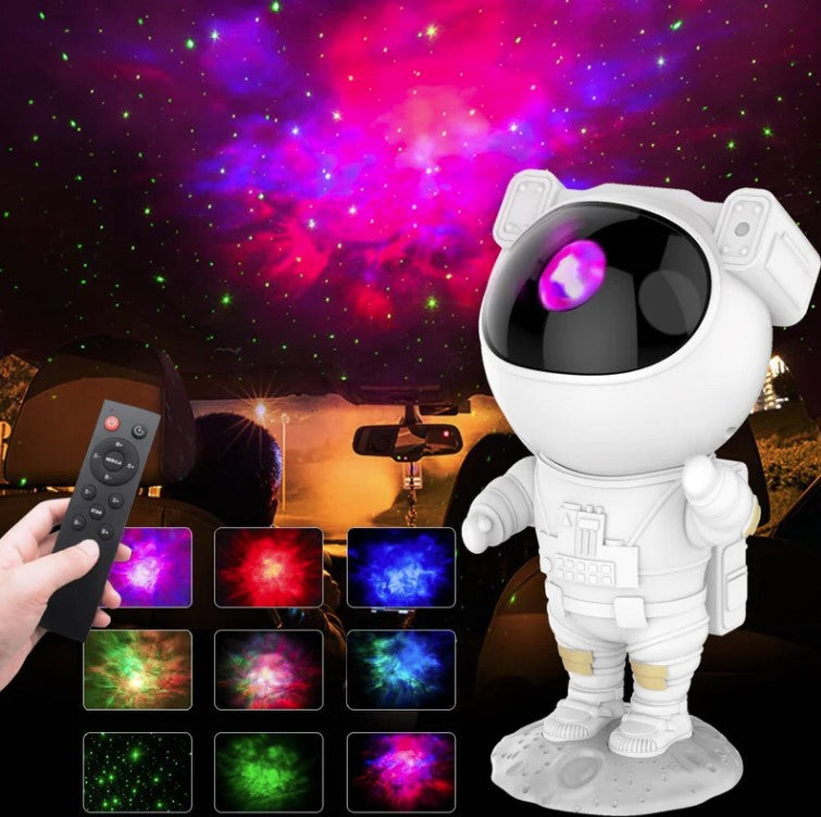 Projetor Astronauta Galaxy branco com multiplas projeçoes.